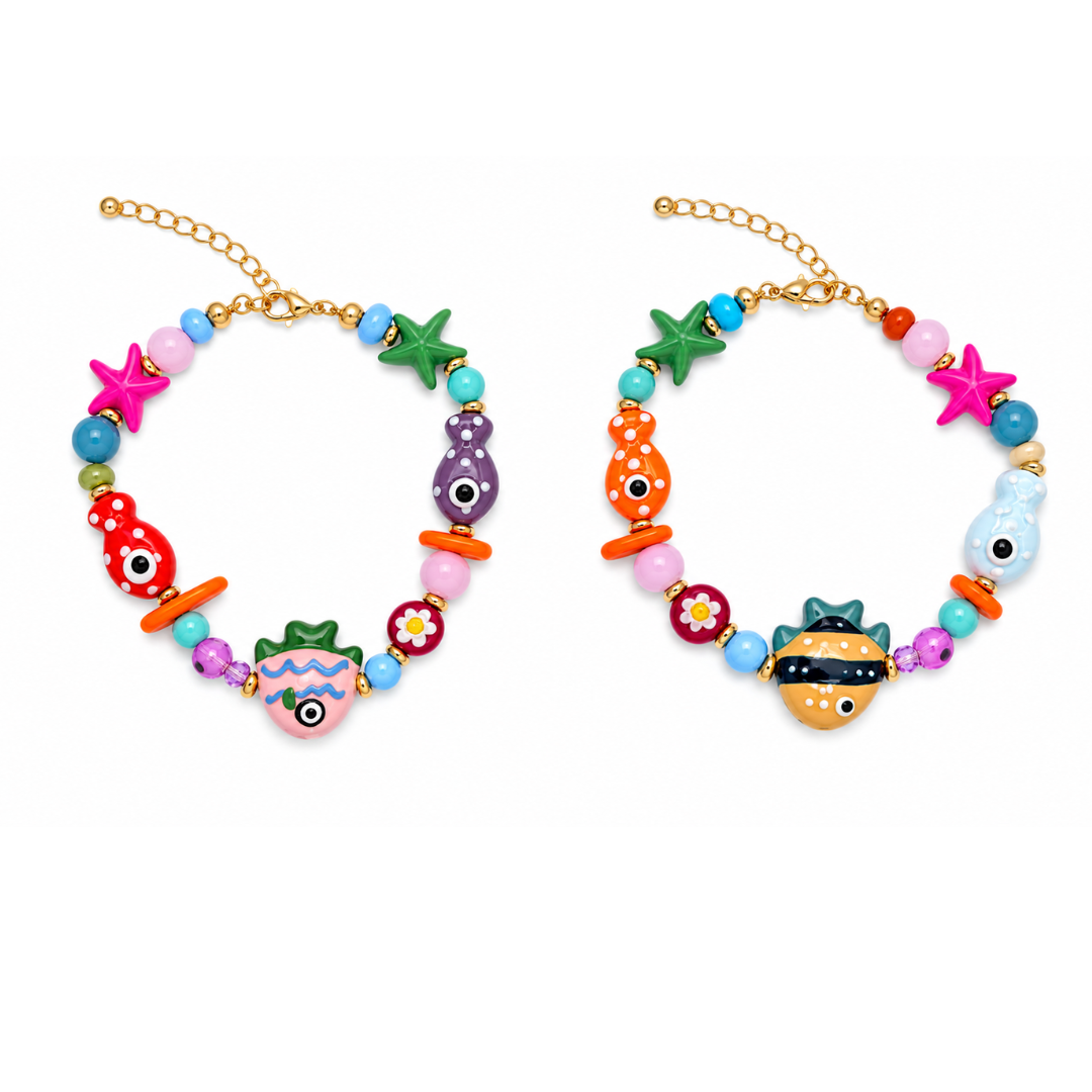 Trinket kralen armband met vissen en zeesterren
