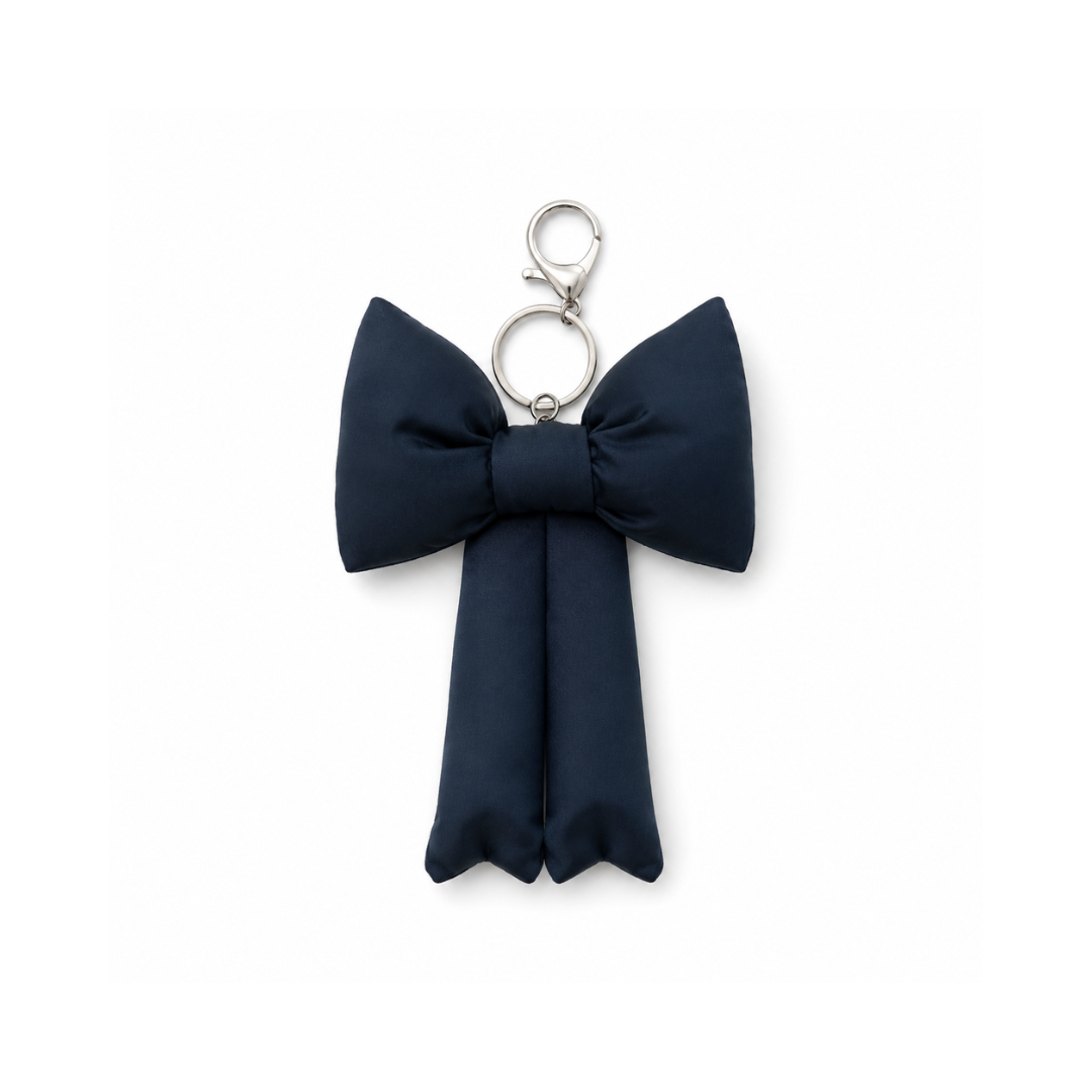 Zwarte puffy bow strik tashanger