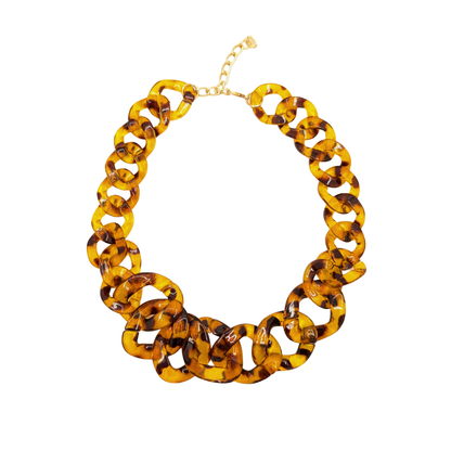 Amberkleurige tortoise schakelketting met grote schakels en goudkleurige sluiting