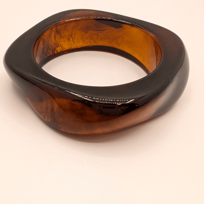 Donker amber asymmetrische bangle armband