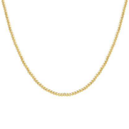 Gouden massieve kralenketting met kleine ronde glanzende kralen – minimalistische ketting op witte achtergrond.