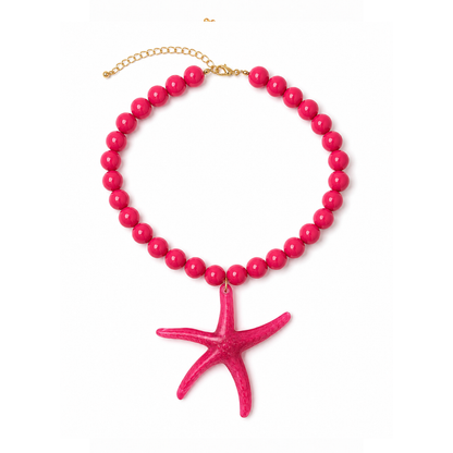 Grote kralenketting met oversized statement zeester bedel fuchsia