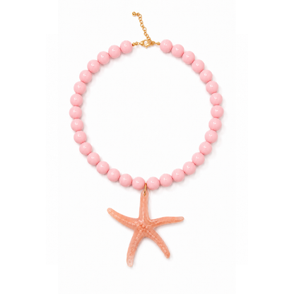 Lichtroze kralenketting Iris met 13,5 mm marble kralen en een oversized zeester bedel van 9 cm.