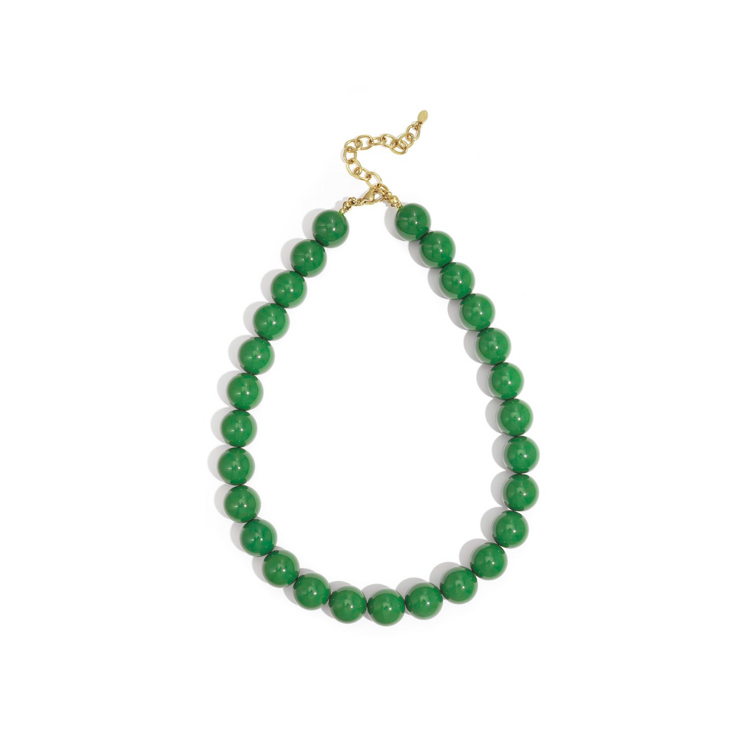 Groene kralenketting met grote glanzende kralen en goudkleurige sluiting