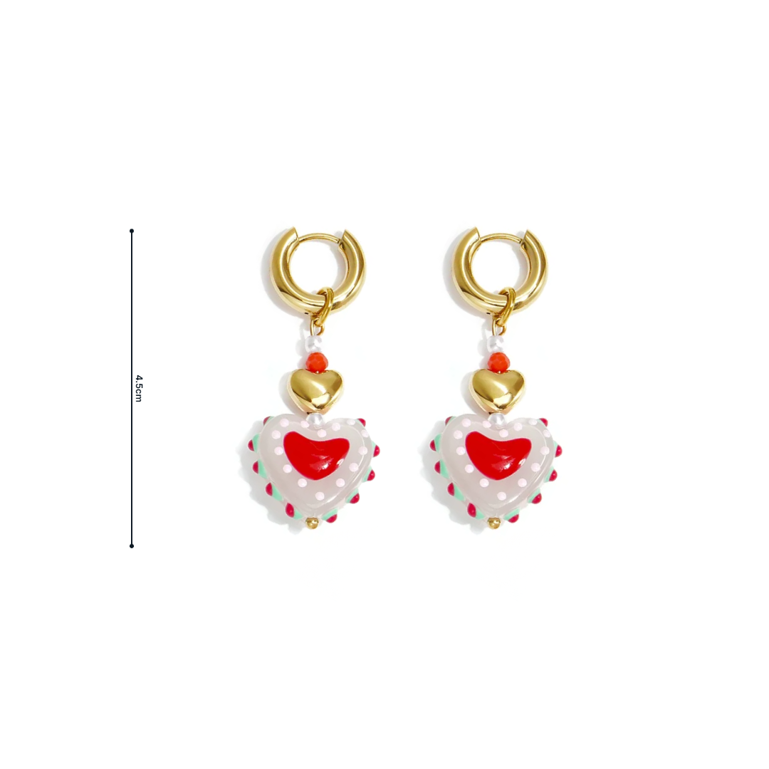 Gouden oorringetjes met wit rood hartje