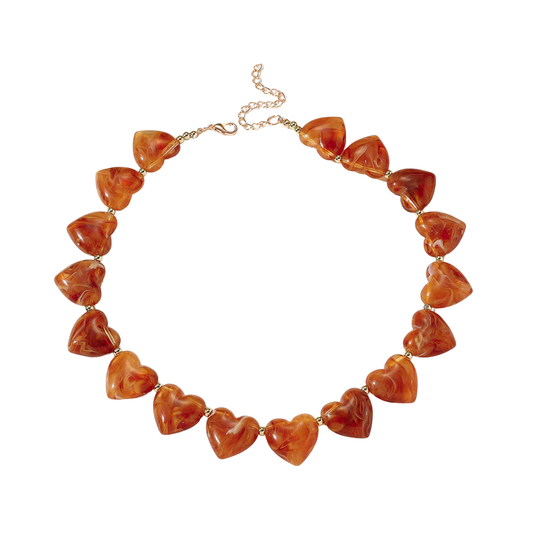 Chunky hartjes ketting met lichtbruine amberkleurige kralen en luxe uitstraling