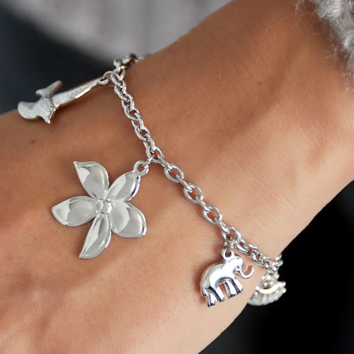 Zilveren bedel armband met lieveheersbeestje olifant bloem vogel blad