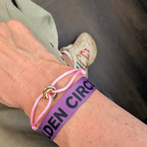 Roze koord armbandje met 3 ringetjes