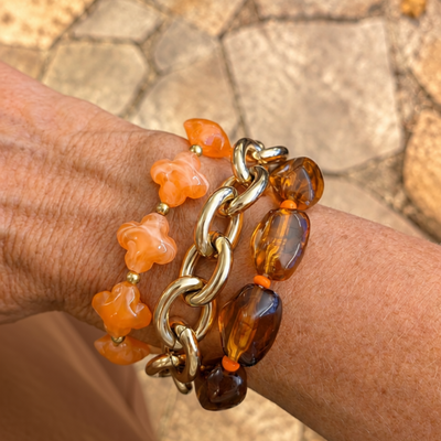 Oranje en amberbruine statement kralenarmbanden set