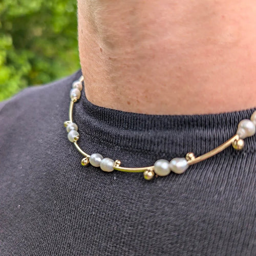 Gouden ketting staafjes pareltjes