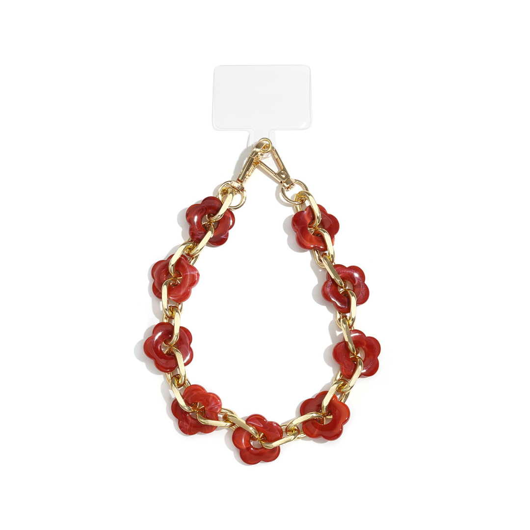 Rood telefoonkoord gemarmerde bloem