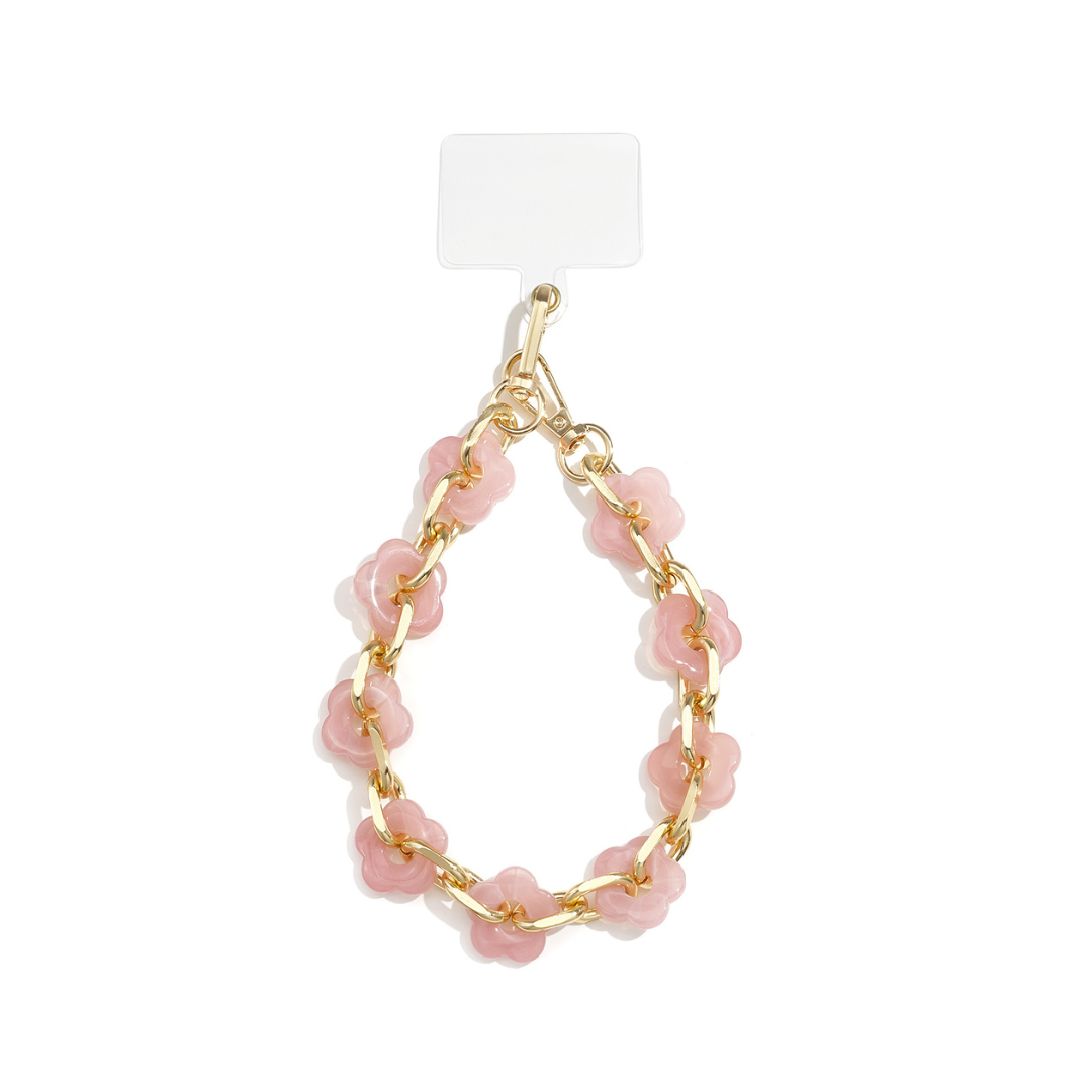 Roze telefoonkoord gemarmerde bloem