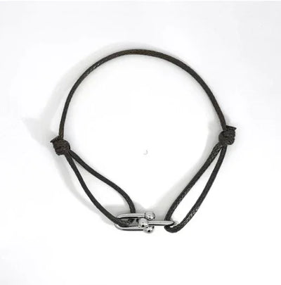 Zwart koord armbandje met zilveren dubbele bedels