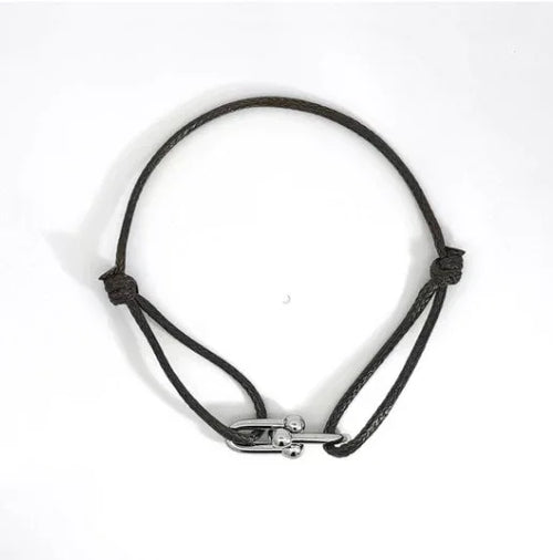 Zwart koord armbandje met zilveren dubbele bedels