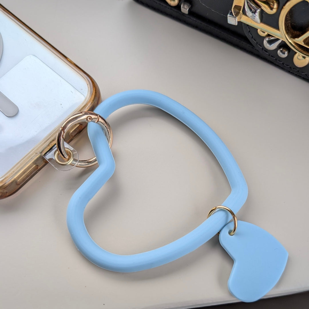 Telefoonkoord dubbel hart lichtblauw aan een telefoon 