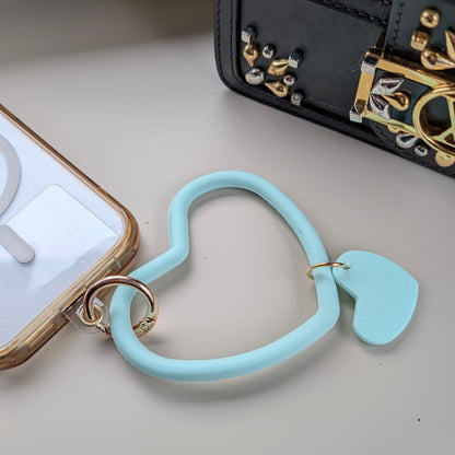 Telefoonkoord dubbel hart mintgroen aan een telefoon 