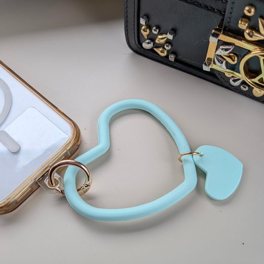 Telefoonkoord dubbel hart mintgroen aan een telefoon 