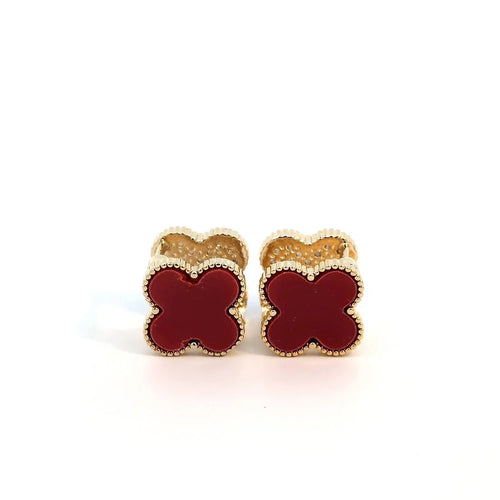 Clover gouden oorknopjes met bordeaux rood andere kant met kleine witte kristallen