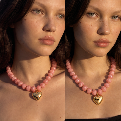 Verschillende lengte roze kralen ketting  met goud hart.