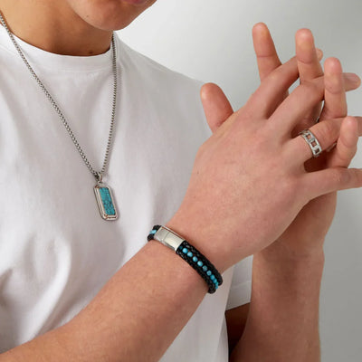 Armband heren gevlochten met turquoise kralen.