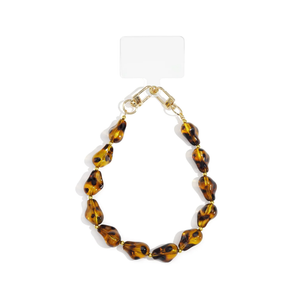 Amber bruine panterprint turtoiseprint  chunky telefoonkoord met marble kralen en gouden sluitingen