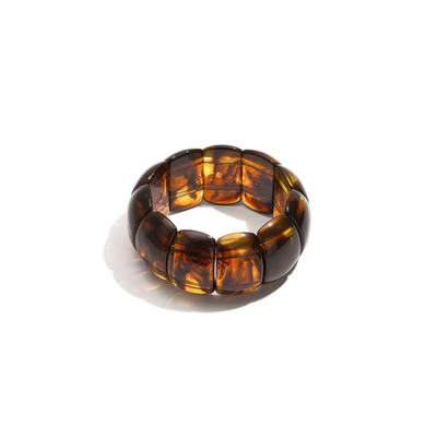 Amber bruine statement armband met brede kralen