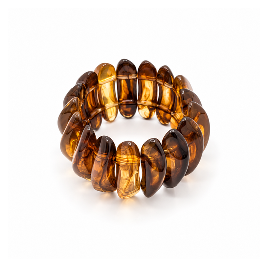 Amberkleurige statement armband met brede gedraaide kralen van Casa Jadel