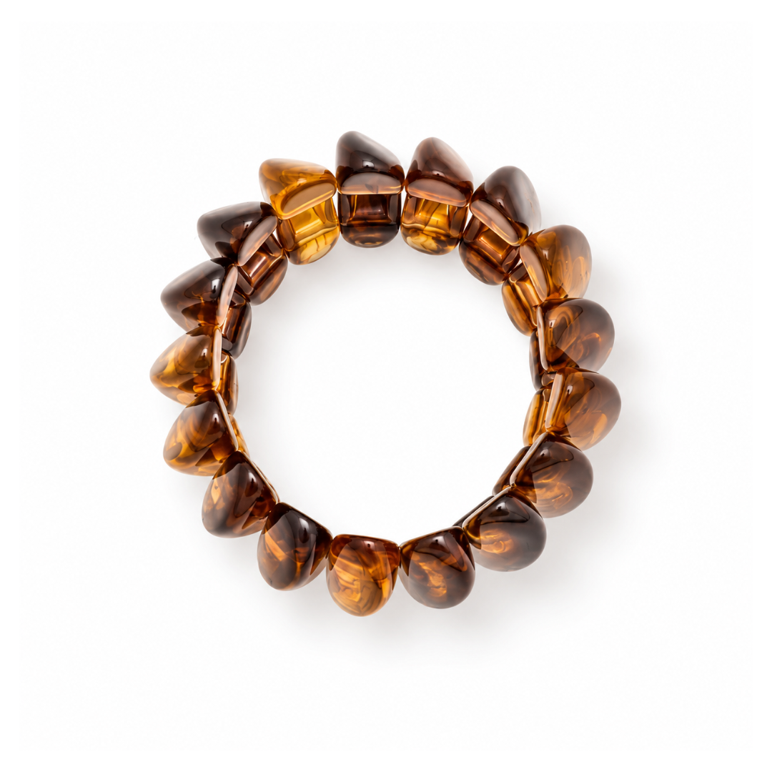 Amberkleurige statement armband met brede gedraaide kralen van Casa Jadel