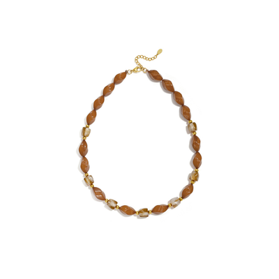 Amber twisted kralenketting met gouden details