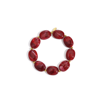 Grote kralen armband gemarmerd donker rood