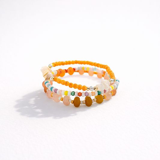 Oranje 3-delige armbandenset Ada met glaskralen en goudaccenten
