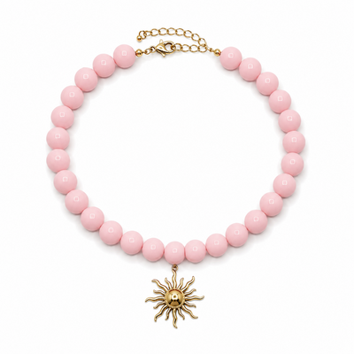 Babyroze grote kralenketting met statement zon bedel