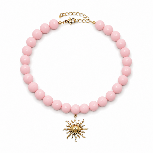 Babyroze grote kralenketting met statement zon bedel