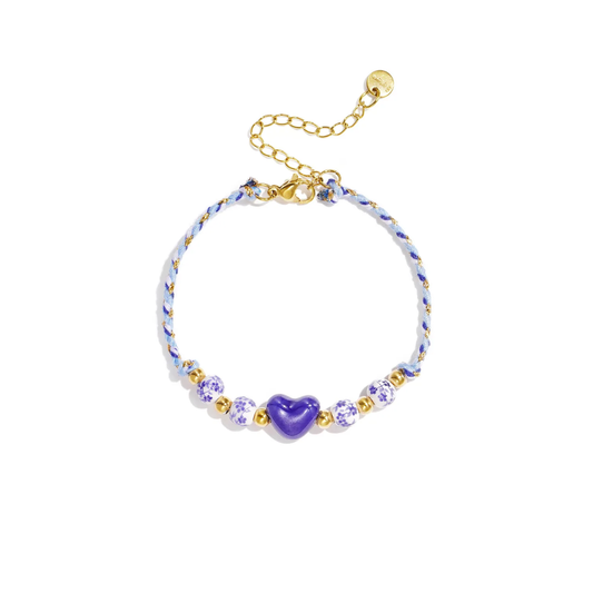 Blauw wit touw armbandje met blauw hartje en bloemenkralen