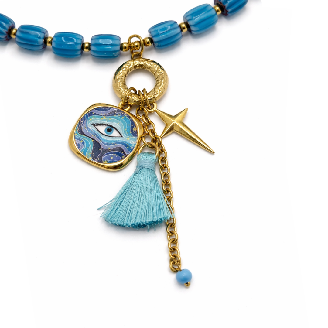Blauwe kralenketting dames met oog bedel ster en kwastje Ibiza stijl inzoom
