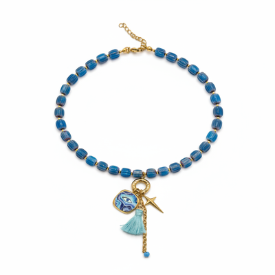 Blauwe glazen kralenketting met kwast en oog