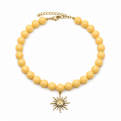 Botergele grote kralenketting met gouden zon bedel van Casa Jadel