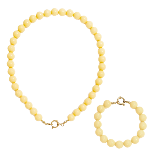 Botergele kralen ketting en armband set met goudkleurig boeislot in Ibiza style