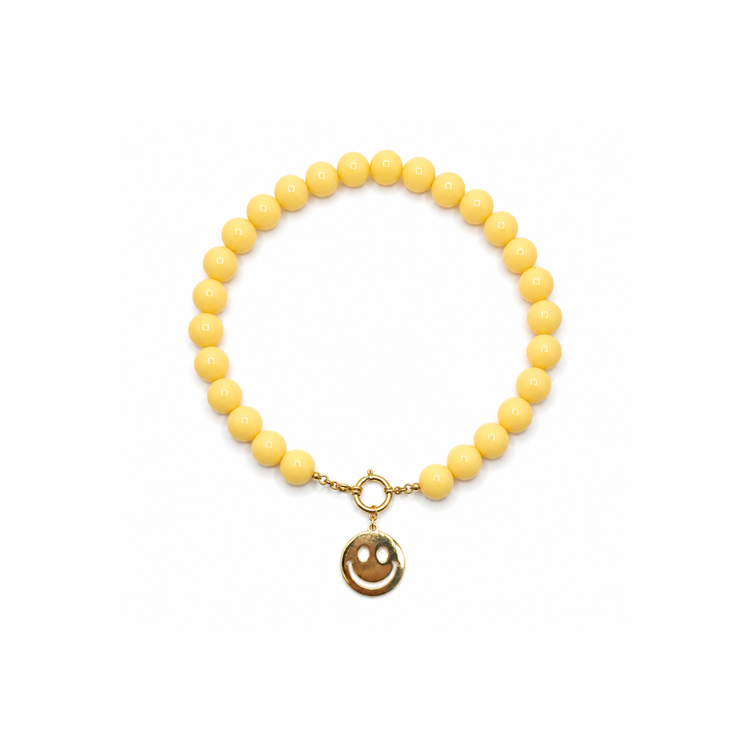 Botergele kralenketting met gouden smiley bedel van Casa Jadel