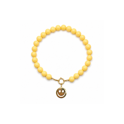 Botergele kralenketting met gouden smiley bedel van Casa Jadel
