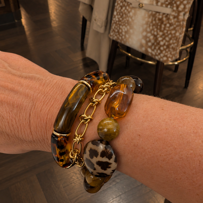 Bruin amber panterprint gouden chunky armbanden set