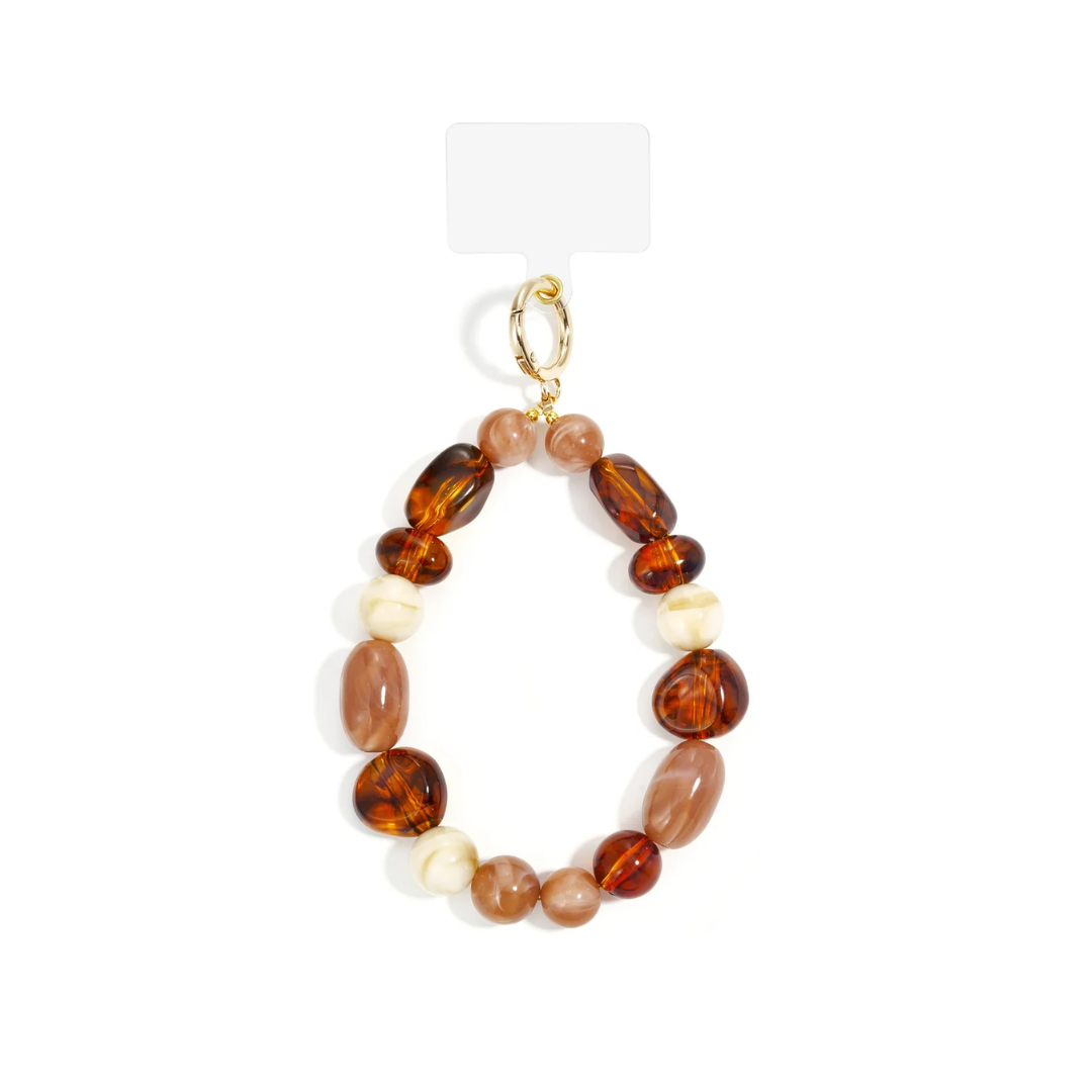 Bruin marble telefoonkoord met amberkleurige en beige kralen