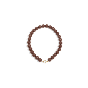 Bruine grote kralenketting met goudkleurig boeislot voor dames.