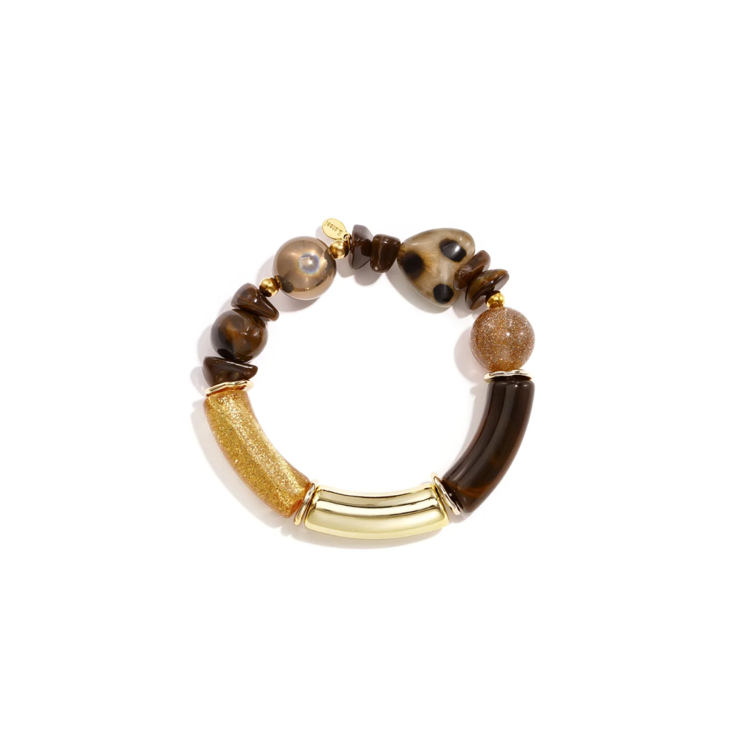 Bruine statement kralenarmband met grote rode kralen en gouden details