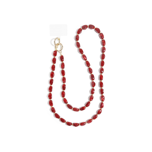 Burgundy chunky telefoonkoord met langwerpige kralen en goudkleurige sluiting.