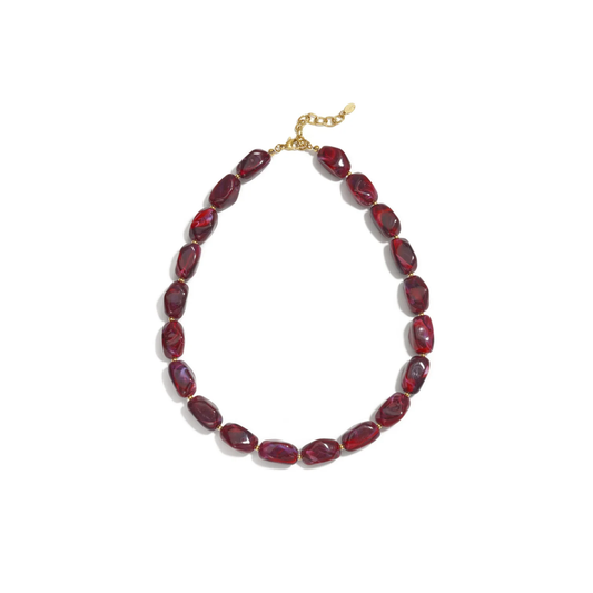 Burgundy chunky statement kralenketting met grote marble kralen en gouden details