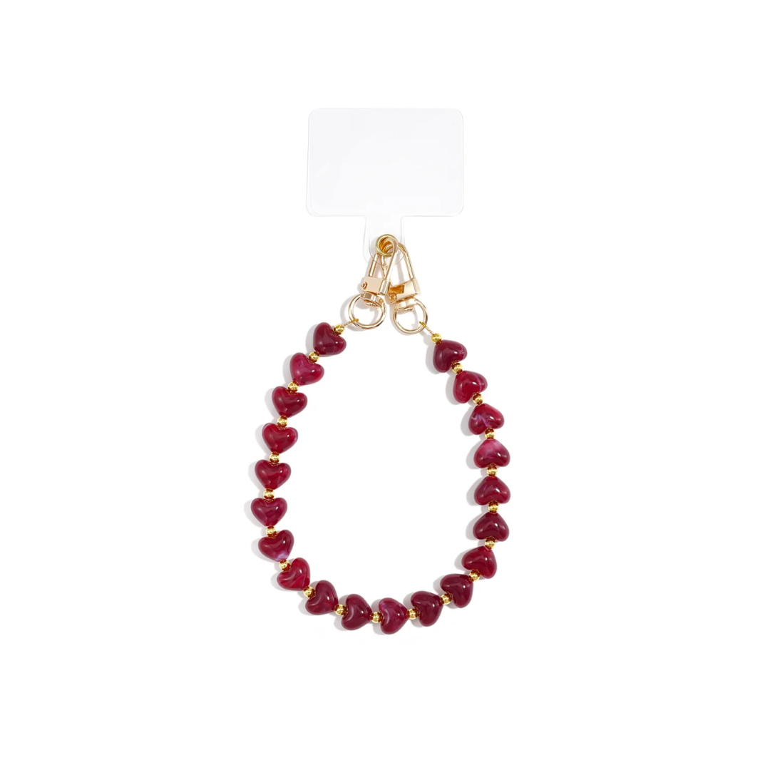 Donkerrode burgundy telefoonkoord van marble hartjes kralen