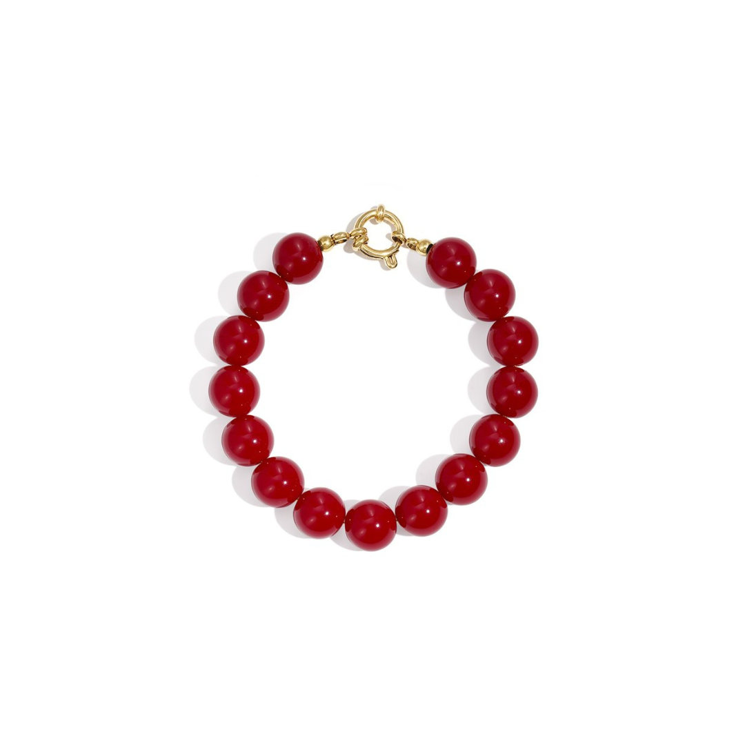 Burgundy kralenarmband met goudkleurig boeislot in Ibiza style