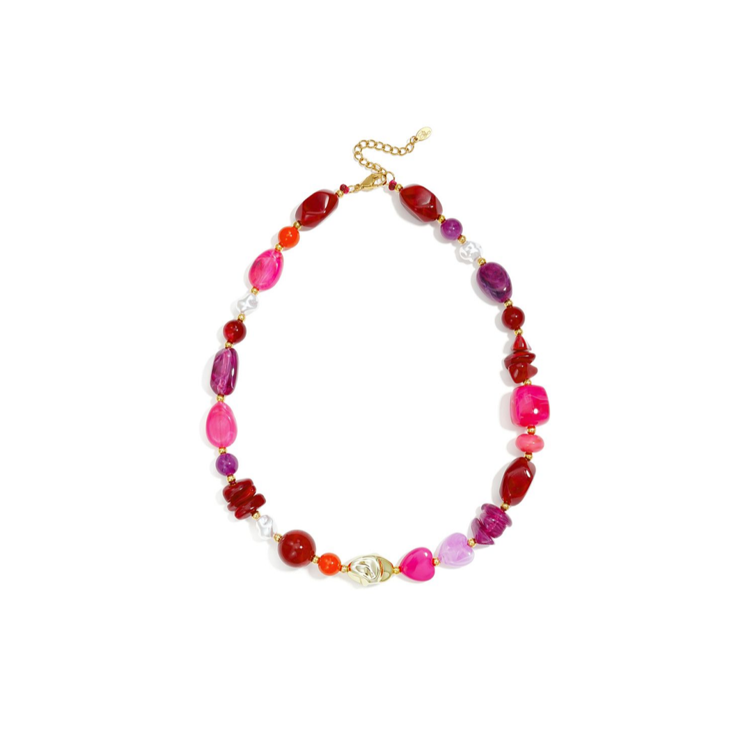 Burgundy-roze mixed chunky kralenketting met verschillende roze en burgundy kralen en gouden details
