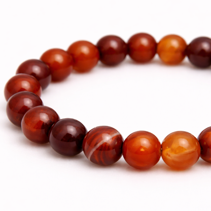 Carneool natuursteen kralenarmband  details dames met oranje rode kralen Casa Jadel